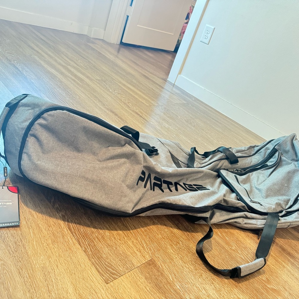 Gray Duffel Bag with Drawstring Closure and Black Straps